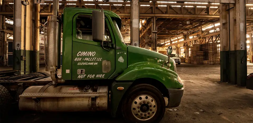 semi truck parked inside Cimino Box and Pallet warehouse